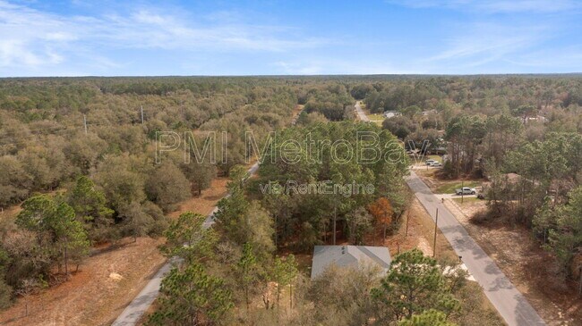 Building Photo - 9461 N Sandree Dr