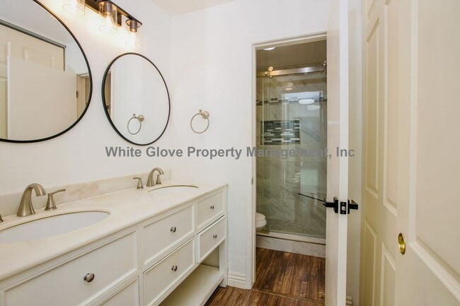 Building Photo - Updated Newport Beach Condo in Gated Versailles Community with Resort-Style Amenities