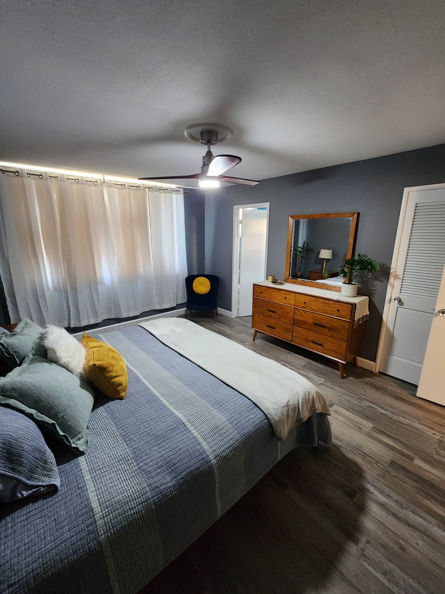 Primary Bedroom with Blackout Curtains shown. - 5180 N Wishon Ave