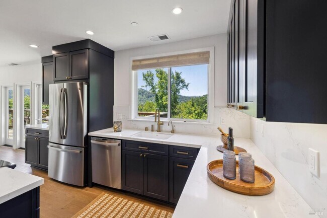 Building Photo - Newly Renovated Ross Four Bedroom & Three Bathroom Home on 1/2 acre with AC and Views