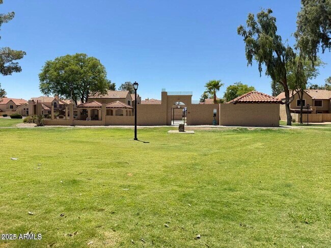 Building Photo - 4601 N 102nd Ave