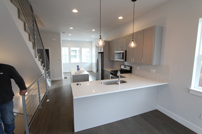 upgraded kitchen and open layout - 1919 W 46th Ave