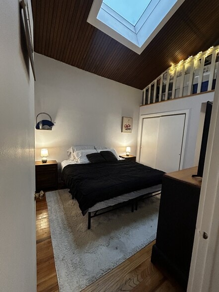 bedroom with view of the loft - 134 Washington St