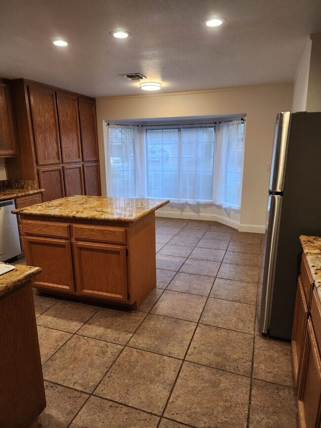 Building Photo - Action Properties RES Inc: offering Single Story, New Paint, Great Room with formal dining area, ...