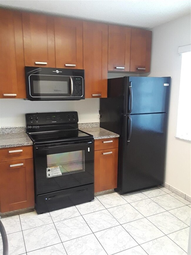 Building Photo - 8700 N Sherman Cir