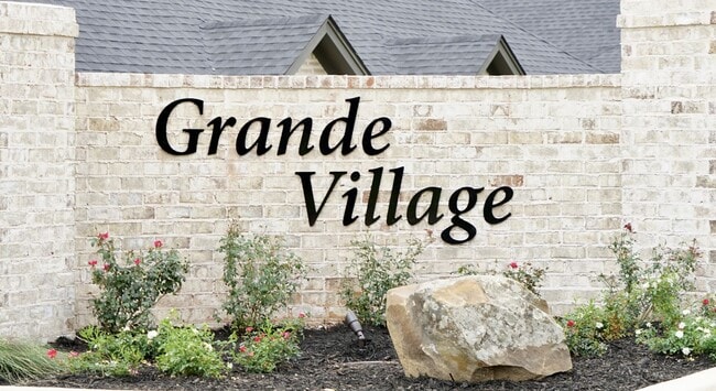 Building Photo - Grande Village #201