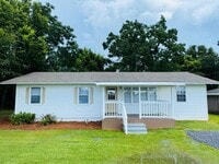Building Photo - 4-Bedroom that has it all !