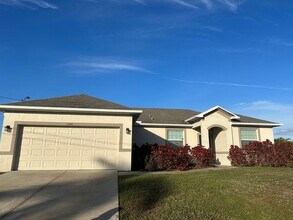 Building Photo - Coming Soon!! NW CAPE CORAL 3 BEDROOM 2 BATHROOM 2 CAR GARGAGE
