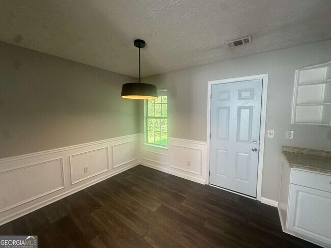 Building Photo - 7467 Petunia Dr