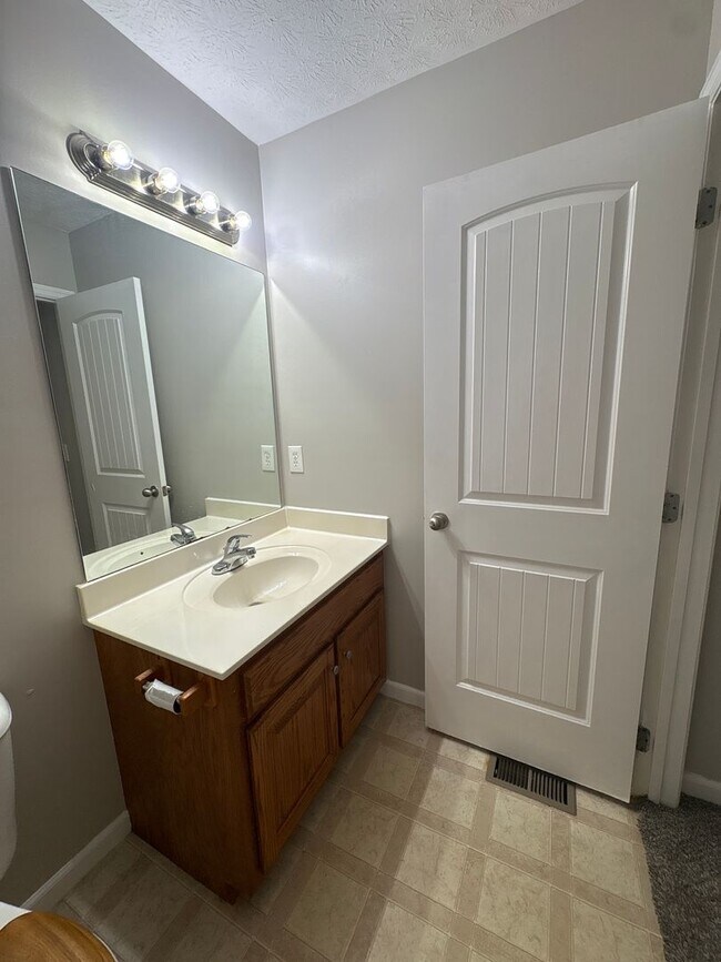 Building Photo - Charming Home with Covered Back Deck and Fenced in Yard...