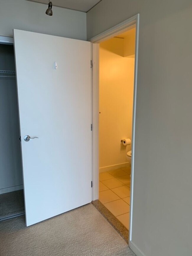 Building Photo - Moana Pacific - 2 bedroom plus den, 2 bath Condo with 2 parking - avail now!