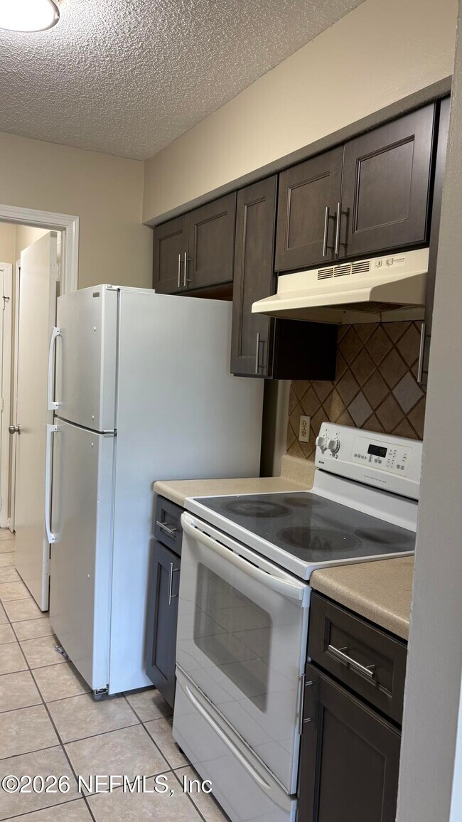 Building Photo - 11467 Fort Caroline Lakes Dr N