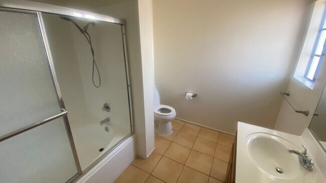 Building Photo - Renovated Townhome, Attached Garage, in Gated HOA Community *READ*