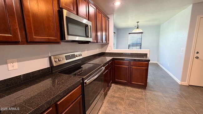 Building Photo - 36532 W Barcelona Ln