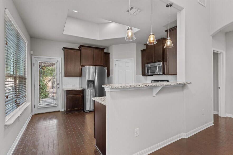 Building Photo - 7709 Menchaca Rd