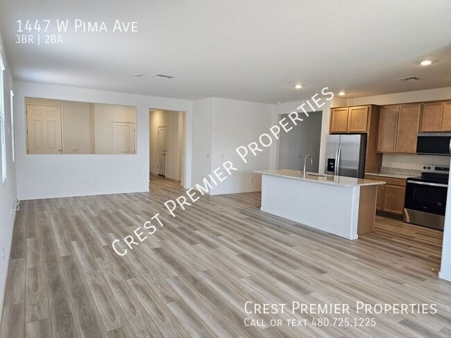 Building Photo - 1447 W Pima Ave