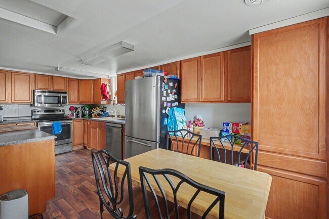 Building Photo - Spacious 3BR Ranch on Large Corner Lot with 2-Car Garage