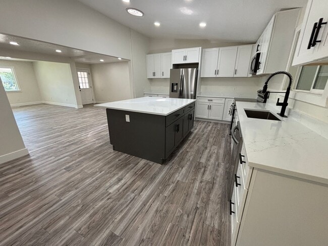 Building Photo - Beautifully Renovated 4-Bedroom Home with Finished Basement