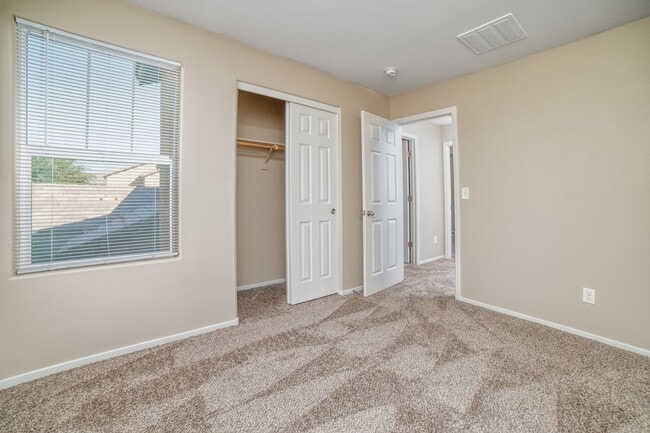 Building Photo - 4-BEDROOM / 3-BATH 2-STORY LOVELY HOME WITHIN GATED COMMUNITY CLOSE TO NELLIS AIR FORCE BASE!