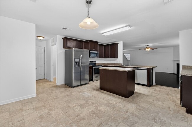 Building Photo - Spacious 4BR Energy-Efficient Home with Loft, Big Yard & Top-Rated Schools!