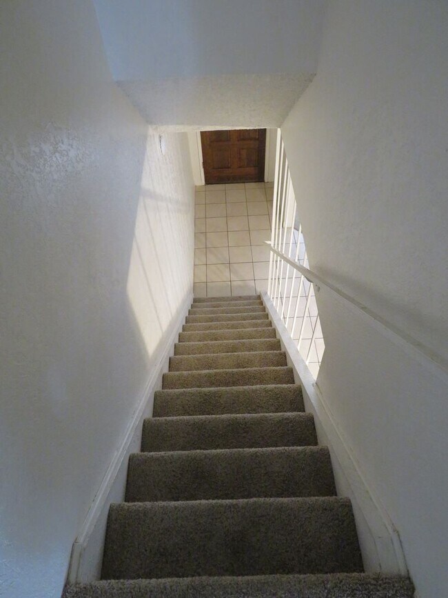 Building Photo - Centrally Located Large Two Story Condo wi...