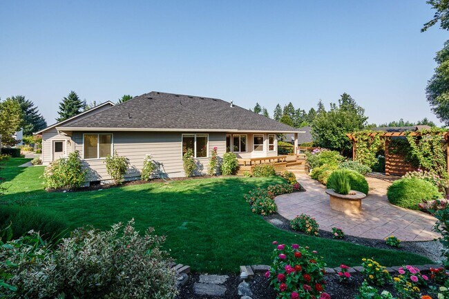 Building Photo - Beautifully Landscaped 1/4 acre with Well Maintained 4 bedroom 2 Bath Home with 3 Car Garage
