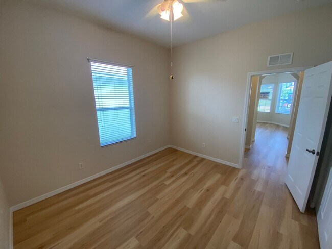 Building Photo - ANNUAL Lease – Unfurnished – Golf Course Lot - Designer Home in the highly sought-after gated com...