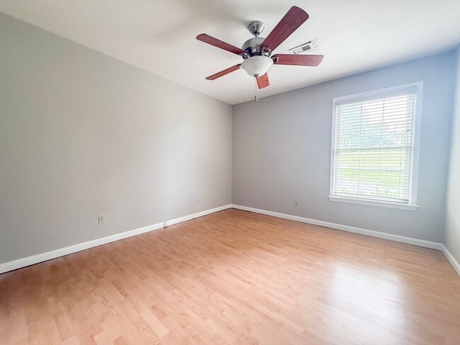 Building Photo - Spacious 3-Bedroom Home with Screened Porch, 2-Car Garage + Workshop