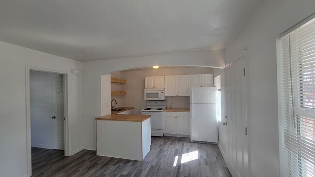 Building Photo - Annual Updated One Bedroom, One Bath Duplex Located in The Village of the Art