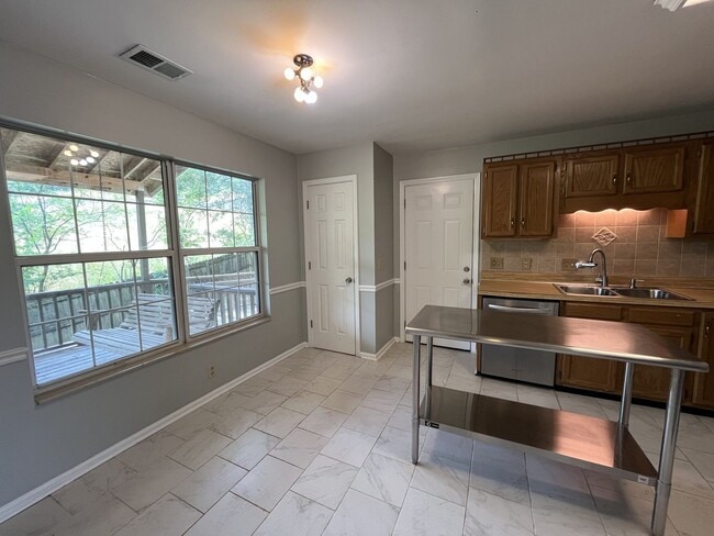 Building Photo - Charming Cul-de-Sac Home with Porch Swing ...