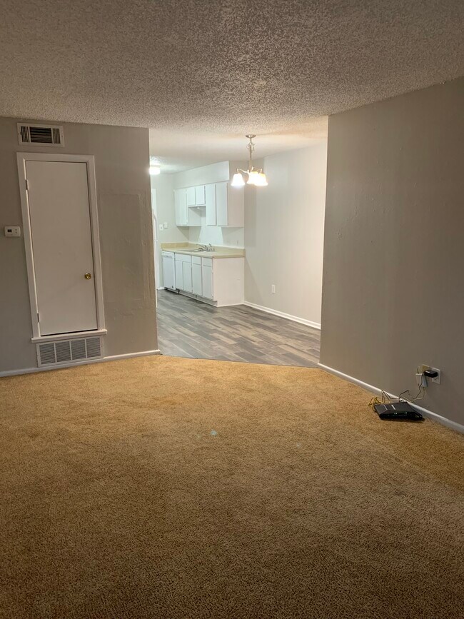 Building Photo - WoodCreek Apartments