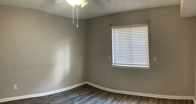 Building Photo - Just off the main road, but in walking dis...