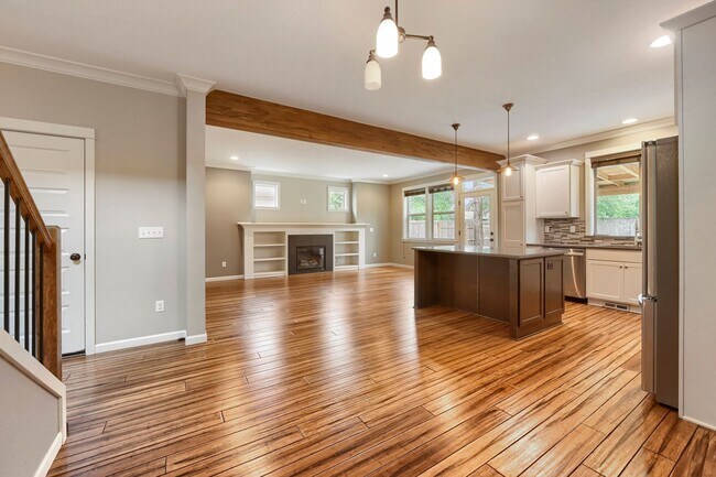 Building Photo - Custom-Built 4BR/2.5BA Two-Story Near Woodstock — Quartz Island Kitchen, Gas Fireplace & Fenced Y...
