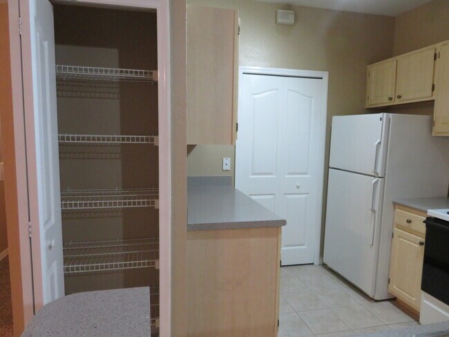 Building Photo - Spacious 4/2 condo in Bella Terra communit...