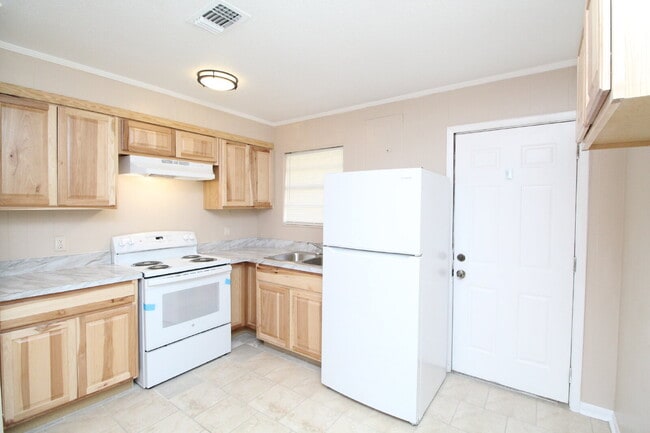 Building Photo - Updated 2BR/1BA Milton Triplex Unit Near Hwy 90 with Tile Flooring, Modern Bath Updates & Voucher...