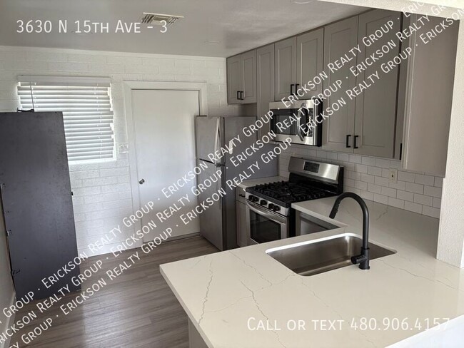 Building Photo - 3630 N 15th Ave