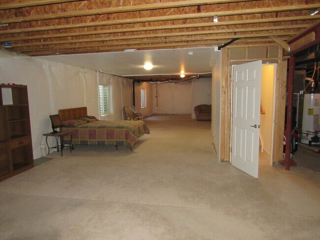 Building Photo - Ranch living in this Spacious Townhome in ...
