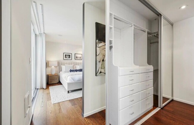 Building Photo - One-of-a-Kind Sophisticated Top-Floor Cond...