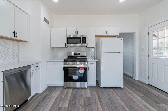 Building Photo - 11107 W Iowa Ave