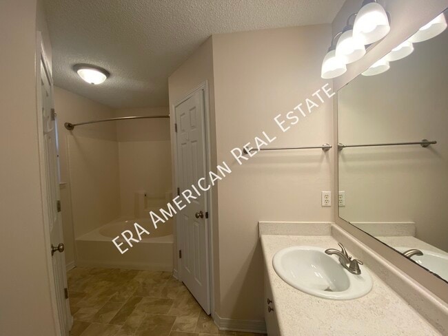 Building Photo - 7418 Woodmont Rd