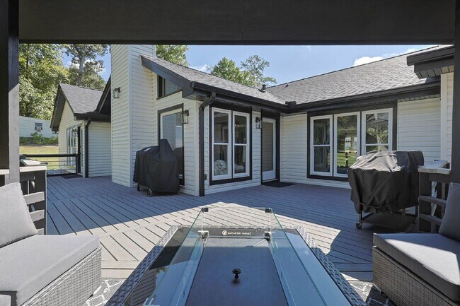 Building Photo - COMING SOON · Designer Renovation · Covered Deck Pavilion · 2-Car Garage · Lawn Care Included