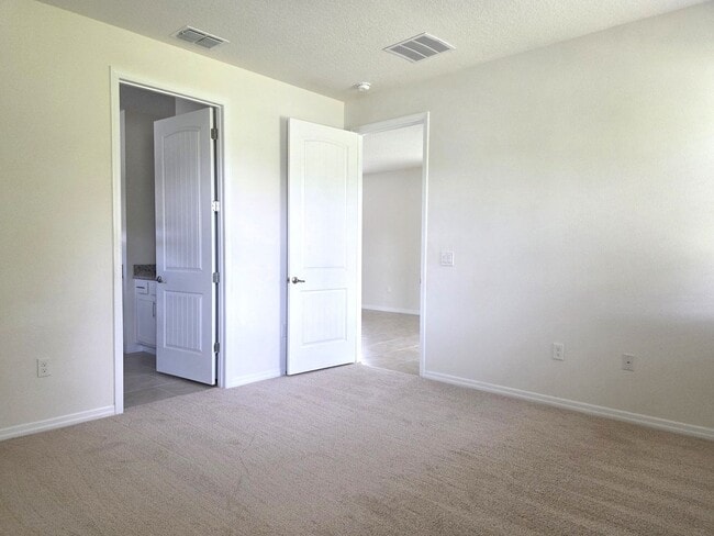 Building Photo - 55+ Gated Community at Palms at Serenoa