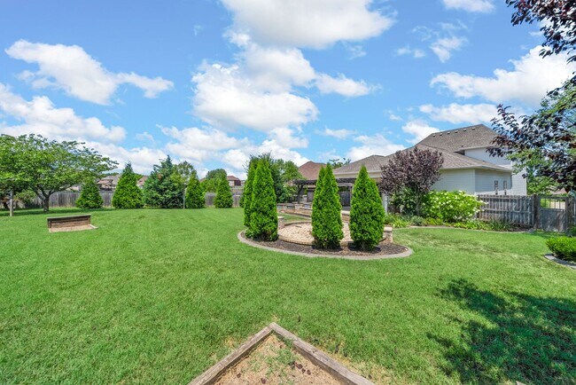 Building Photo - Elegant 4-Bedroom Home with Vaulted Ceilin...