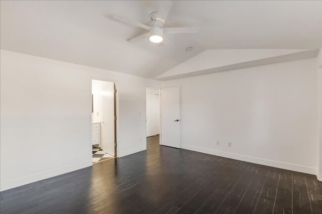 Building Photo - Versatile 4-Bedroom Corner Condo with Main...