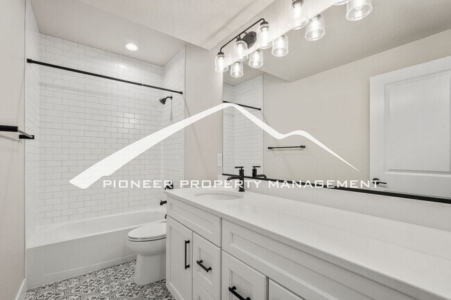Building Photo - Main Floor Primary Home in Flying Horse with 5 Bedrooms, Gourmet Kitchen, Finished Basement & 4-C...