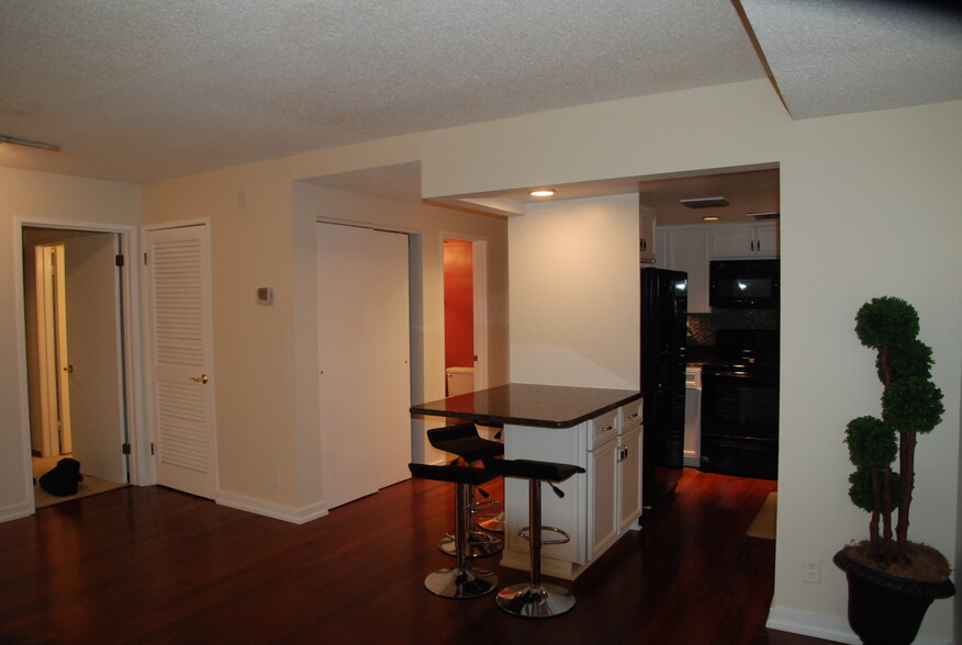 Front hall, front coat closet, 1/2 bath, kitchen - 3 Washington Cir NW