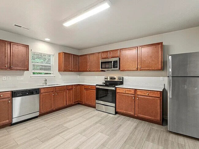 Building Photo - Earn Wealth While Leasing - Like a Homeown...