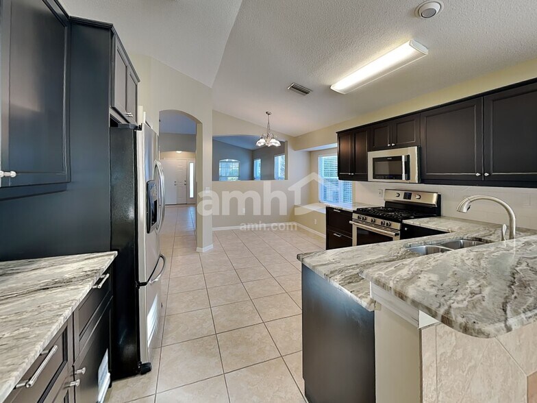 Building Photo - 12061 Winding Woods Way