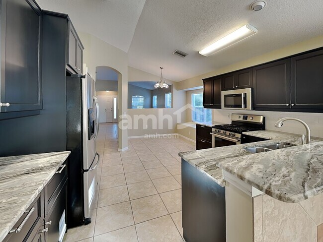 Building Photo - 12061 Winding Woods Way