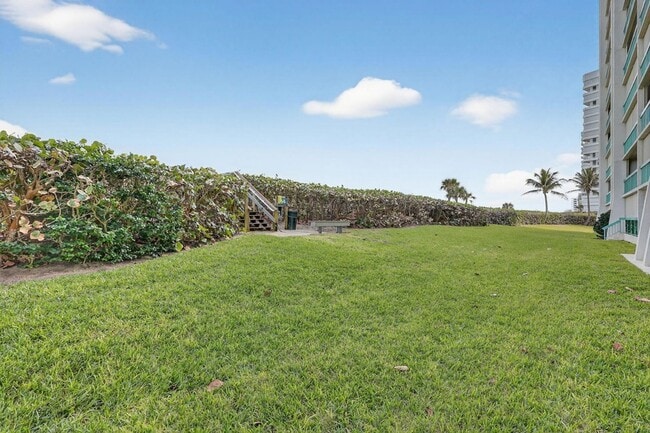 Building Photo - 9940 S Ocean Dr